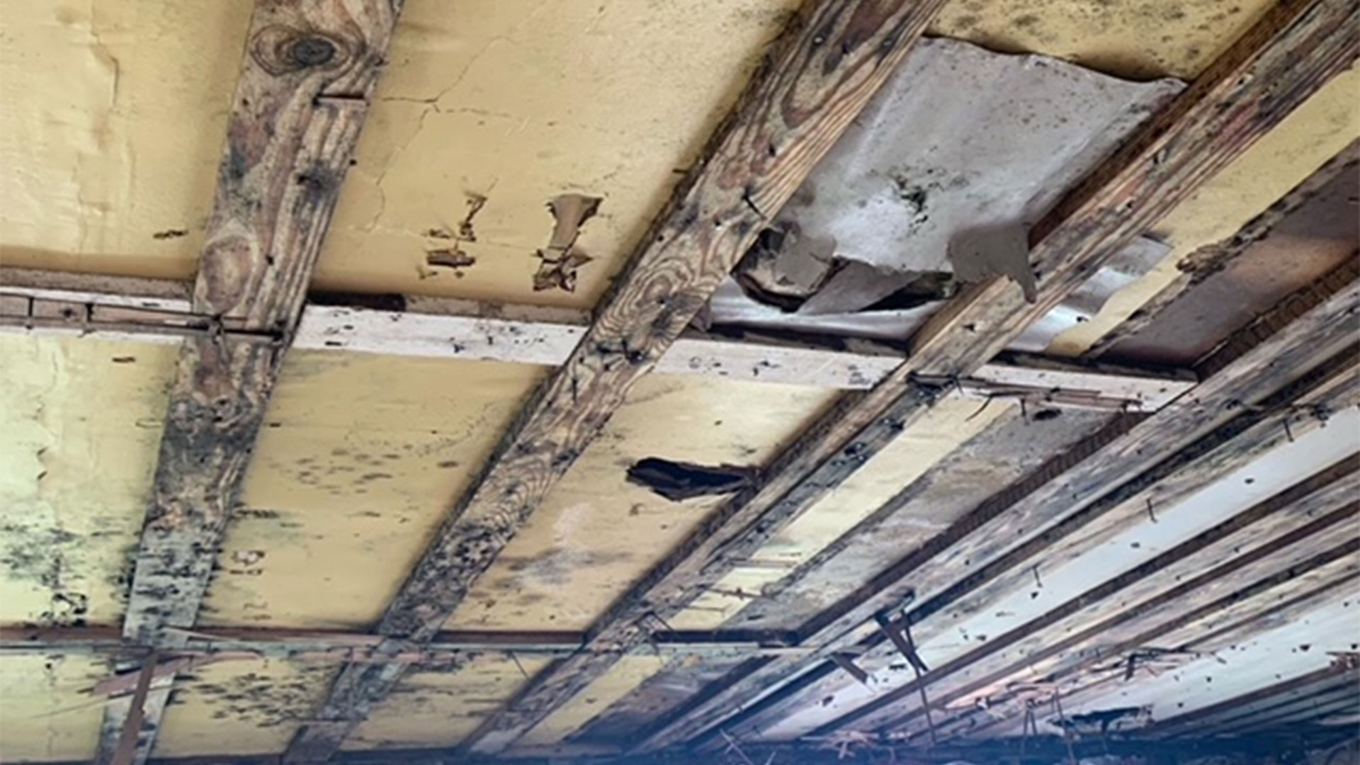 house ceiling close up with fire damages birmingham al